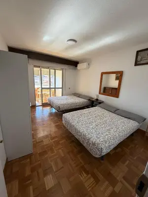 Cama o camas de una habitación en Private Rooms Madrid Atocha