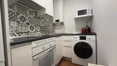Una cocina o zona de cocina en Central and Cozy in Madrid 3D