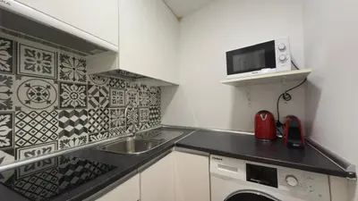 Una cocina o zona de cocina en Centrally located in Madrid 3I