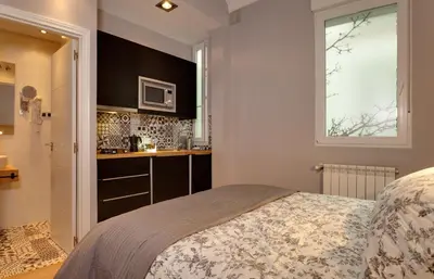 Cama o camas de una habitación en SUITES YOU Platinum