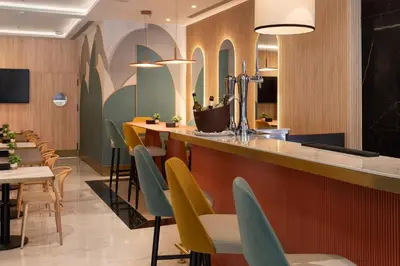 Una televisión o centro de entretenimiento en Catalonia Plaza España Hotel & Spa