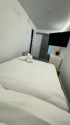 Cama o camas de una habitación en JACUZZI ROOMS PUENTE De VALLECAS