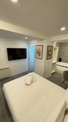 Cama o camas de una habitación en JACUZZI ROOMS PUENTE De VALLECAS