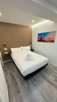 Cama o camas de una habitación en JACUZZI ROOMS PUENTE De VALLECAS