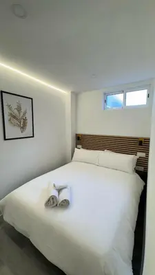 Cama o camas de una habitación en JACUZZI ROOMS PUENTE De VALLECAS