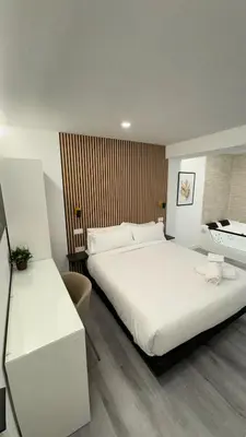 Cama o camas de una habitación en JACUZZI ROOMS PUENTE De VALLECAS