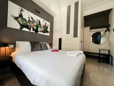 Cama o camas de una habitación en Habitación Oasis E centro de Madrid