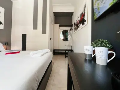 Cama o camas de una habitación en Habitación Oasis E centro de Madrid