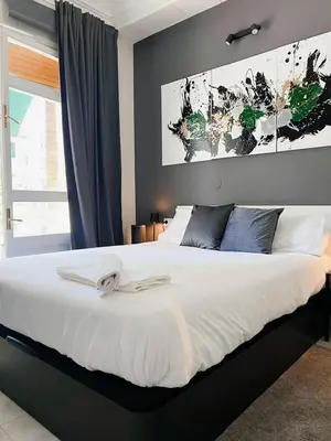 Cama o camas de una habitación en Habitación Oasis E centro de Madrid