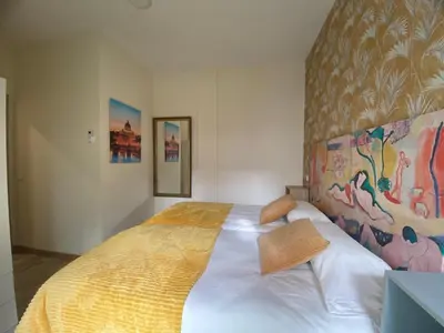 Cama o camas de una habitación en Parque Olof Palme