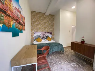Cama o camas de una habitación en Parque Olof Palme