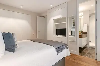 Cama o camas de una habitación en Stylish 1BR Apartment with City Views – Colón
