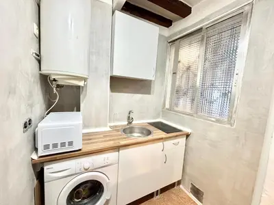 Una cocina o zona de cocina en Centro San Isidro Labrador 01