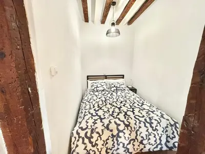 Cama o camas de una habitación en Centro San Isidro Labrador 01