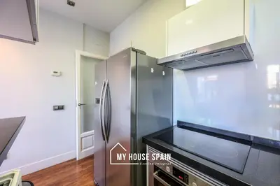 Una cocina o zona de cocina en MyHouseSpain - Luminoso piso con Terraza