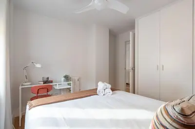 Cama o camas de una habitación en Nice and bright apartment in Puerta del Ángel - Cabello