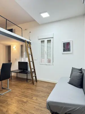 Una televisión o centro de entretenimiento en Apartamentos Day Madrid PLAZA DE ESPAÑA I