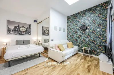 Cama o camas de una habitación en MyHouseSpain - Acogedor estudio en Madrid