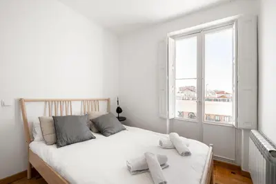 Cama o camas de una habitación en Bright apartment-4Bedrooms 2Bathrooms - Goya