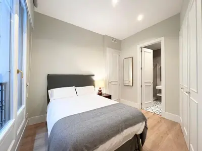 Cama o camas de una habitación en Alcalá Gate exquisite Luxury Seasonal