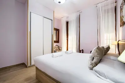 Cama o camas de una habitación en Tirso de Molina I - 3 dormitorios, 2 baños