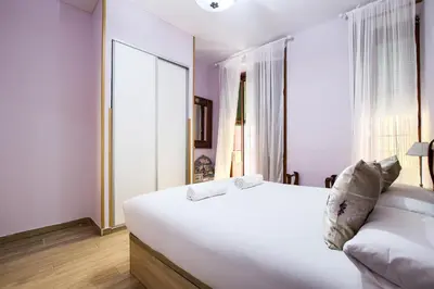 Cama o camas de una habitación en Tirso de Molina I - 3 dormitorios, 2 baños