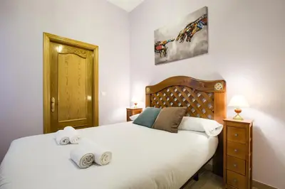 Cama o camas de una habitación en Tirso de Molina I - 3 dormitorios, 2 baños