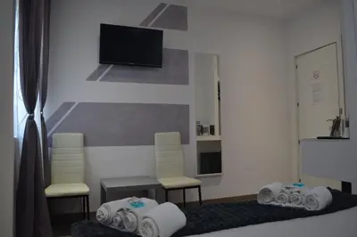 Cama o camas de una habitación en Hostal Meyra