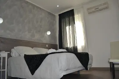 Cama o camas de una habitación en Hostal Meyra