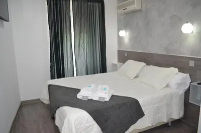 Cama o camas de una habitación en Hostal Meyra