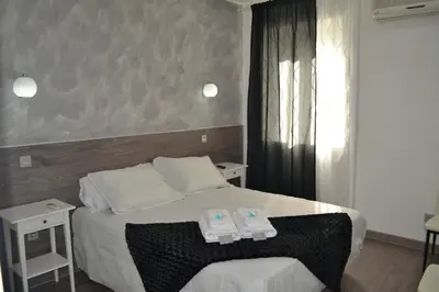 Cama o camas de una habitación en Hostal Meyra