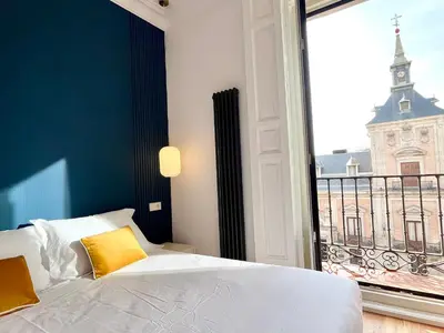 Cama o camas de una habitación en dPLACE to Be - Apartamentos de Lujo en Centro Histórico