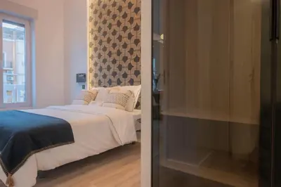 Cama o camas de una habitación en Spacious apartment Madrid Centro Temporal ASB195