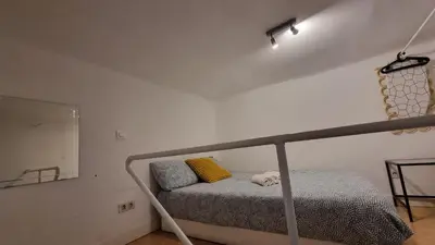 Cama o camas de una habitación en Apartamento MADRID CENTRO MALASAÑA