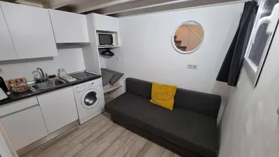 Una cocina o zona de cocina en Apartamento MADRID CENTRO MALASAÑA