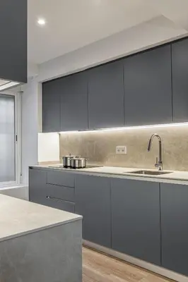 Una cocina o zona de cocina en Queen's Plaza España Boutique - Alojamiento Corta Estancia