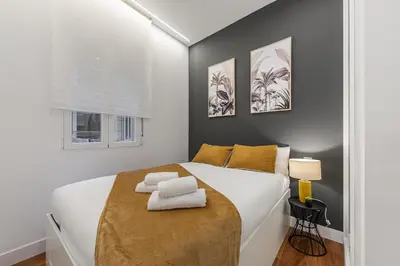 Cama o camas de una habitación en Queen's Las Letras Boutique I - Alojamiento Corta Estancia