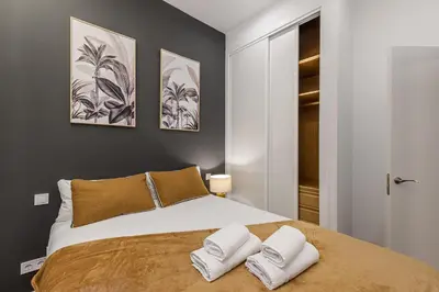 Cama o camas de una habitación en Queen's Las Letras Boutique I - Alojamiento Corta Estancia