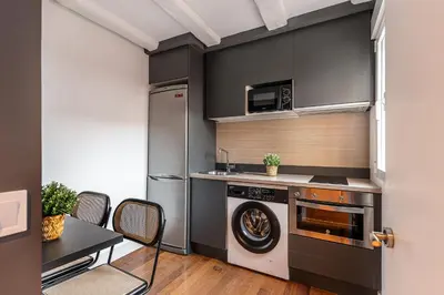Una cocina o zona de cocina en Queen's Las Letras Boutique II - Alojamiento Corta Estancia