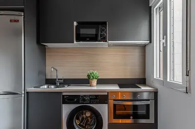 Una cocina o zona de cocina en Queen's Las Letras Boutique II - Alojamiento Corta Estancia