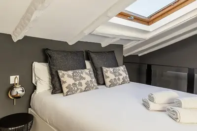 Cama o camas de una habitación en Queen's Las Letras Boutique II - Alojamiento Corta Estancia