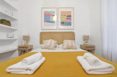 Cama o camas de una habitación en Hogar Malasaña