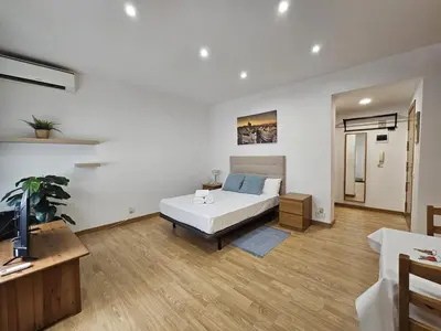 Cama o camas de una habitación en Magico estudio en Plaza España