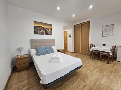 Cama o camas de una habitación en Magico estudio en Plaza España