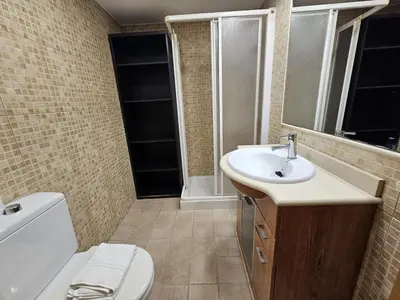 Un baño de Magico estudio en Plaza España