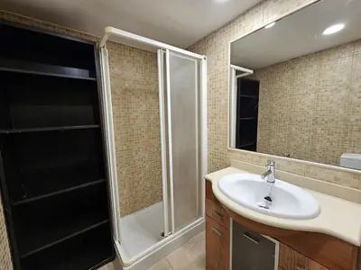Un baño de Magico estudio en Plaza España