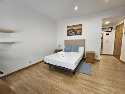 Cama o camas de una habitación en Magico estudio en Plaza España