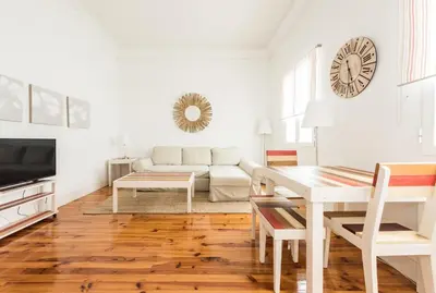 Una televisión o centro de entretenimiento en Apartamentos Alcalá