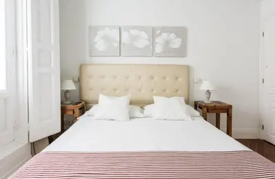 Cama o camas de una habitación en Apartamentos Alcalá