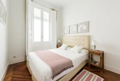 Cama o camas de una habitación en Apartamentos Alcalá